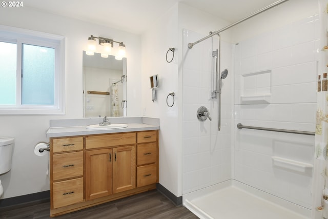 34603 SE Jarl Rd, Boring, OR 97009 - full bathroom with toilet, a shower with shower curtain, vanity, wood finished floors, and baseboards