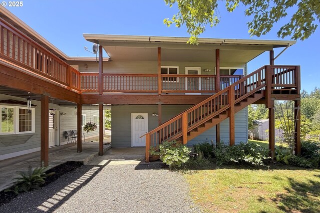 34603 SE Jarl Rd, Boring, OR 97009 - view of front of property with a wooden deck, stairs, and a patio
