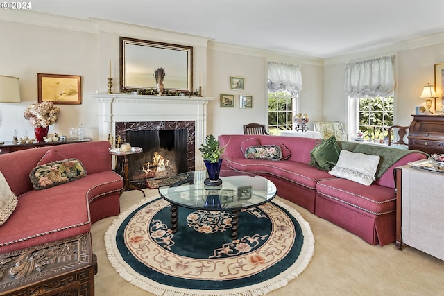 carpeted living room featuring a high end fireplace and crown molding