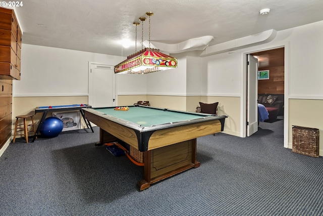 playroom featuring dark colored carpet, wood walls, and billiards