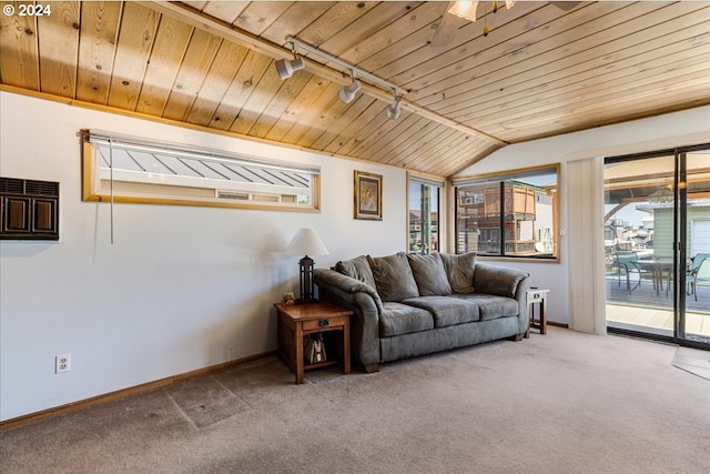 carpeted living room with rail lighting, lofted ceiling, and wood ceiling