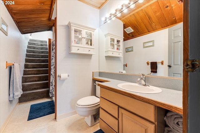 bathroom featuring toilet, vanity, vaulted ceiling, and wood ceiling