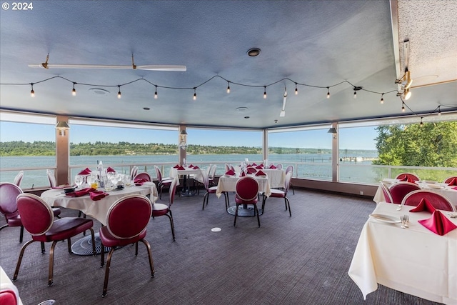 view of patio featuring a water view