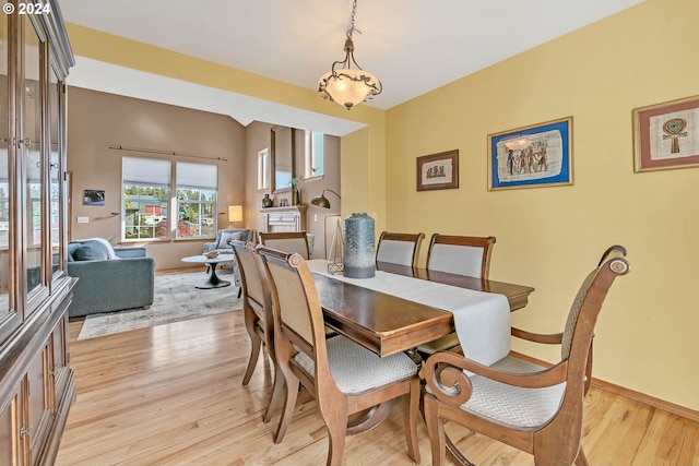 dining area with light wood-type flooring