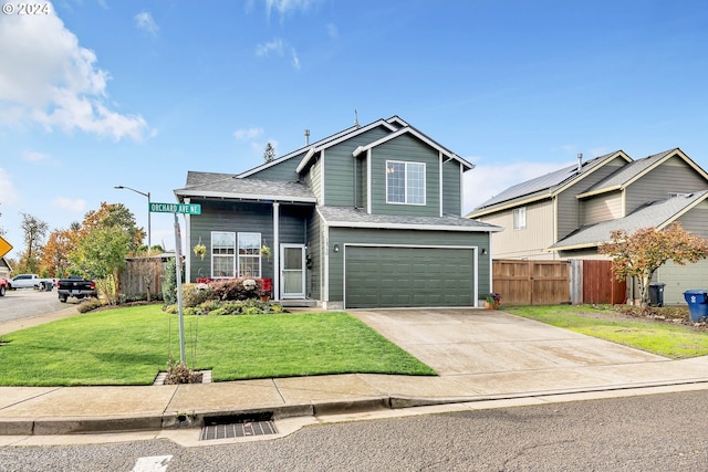 view of front of property featuring a garage, a front lawn, fence, roof with shingles, and concrete driveway
