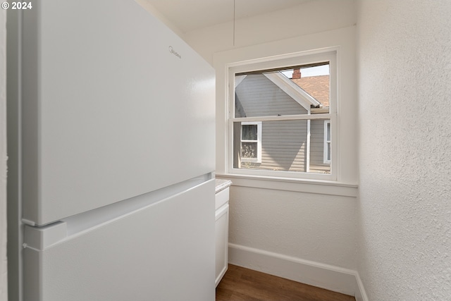 hallway featuring hardwood / wood-style flooring