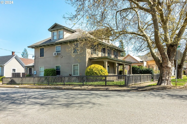 view of front of home featuring cooling unit