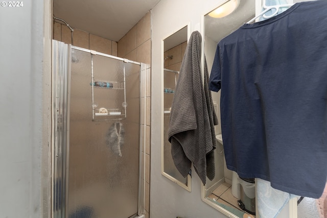 bathroom with an enclosed shower