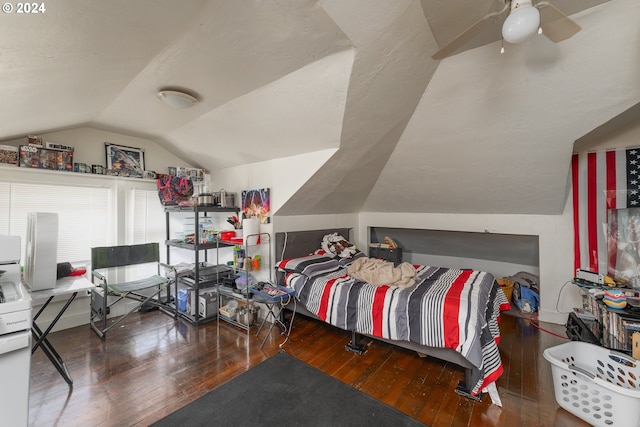 bedroom featuring wood-type flooring, ceiling fan, and vaulted ceiling