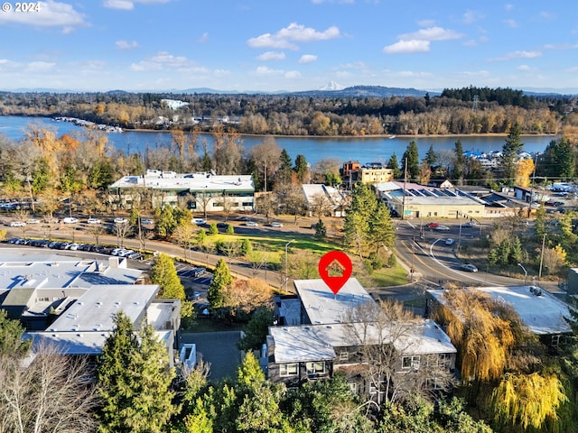 bird's eye view with a water view