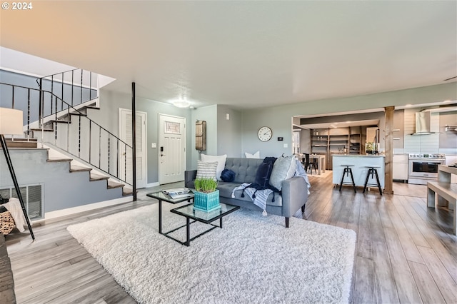 living room featuring wood-type flooring