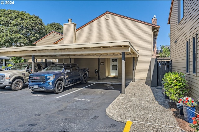 view of parking featuring a carport