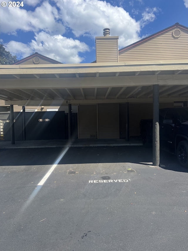 view of car parking with a carport