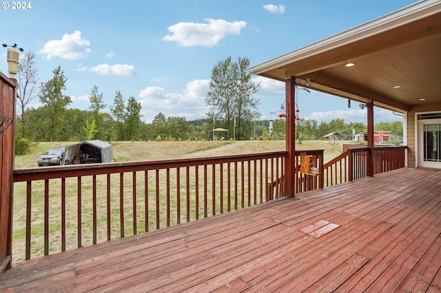 deck featuring a lawn