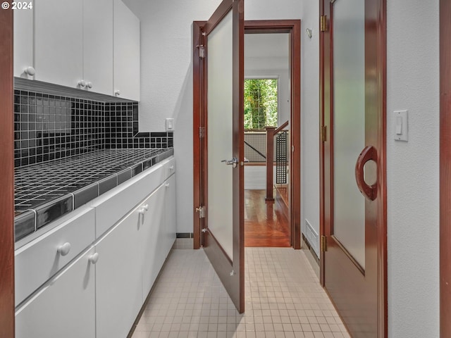 washroom featuring light tile patterned floors