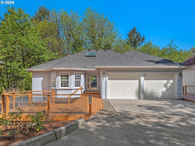 ranch-style house featuring a garage