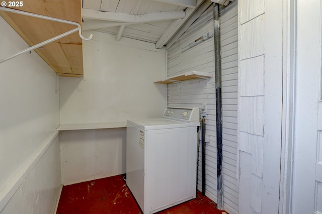 washroom featuring washer / dryer and laundry area