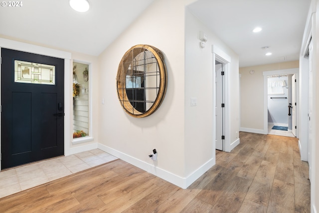 foyer entrance featuring light hardwood / wood-style flooring