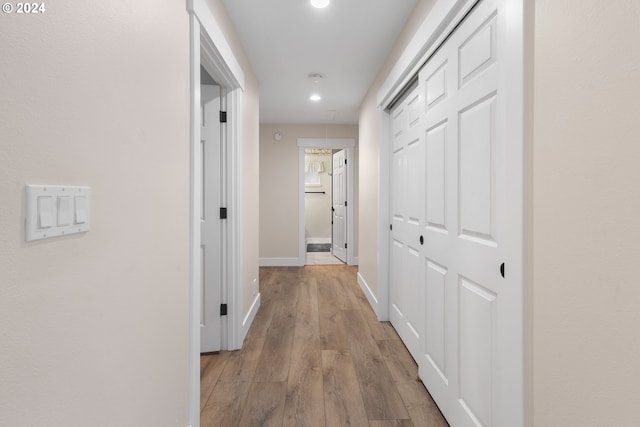 hallway featuring light hardwood / wood-style flooring