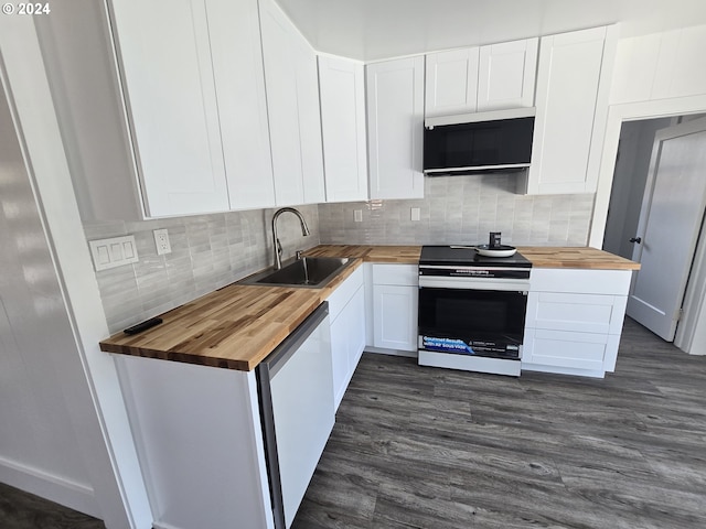 kitchen featuring wood counters, electric stove, dishwashing machine, and white cabinets