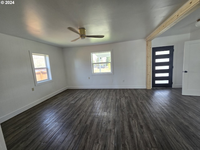 interior space featuring dark hardwood / wood-style floors and ceiling fan