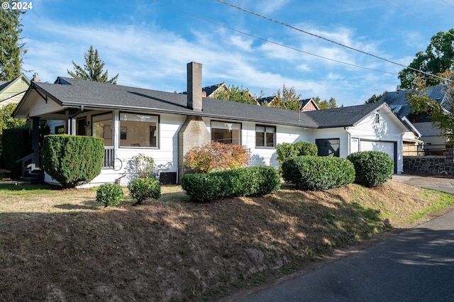 single story home with a garage