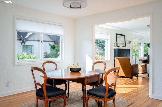 dining area featuring light wood-type flooring