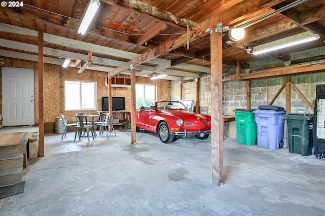 garage featuring a carport