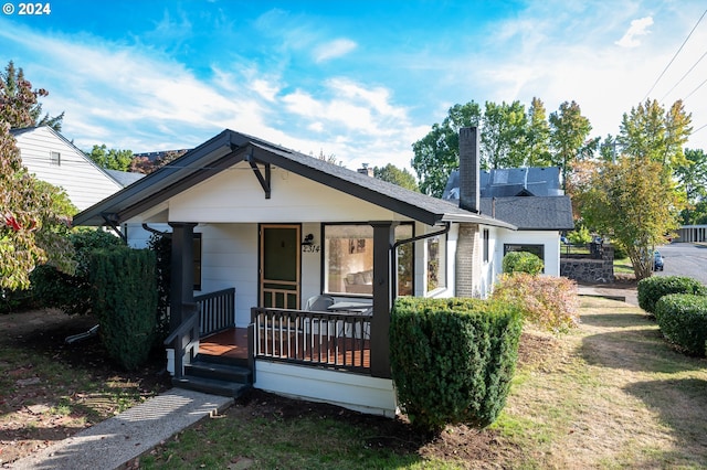 bungalow-style house featuring covered porch