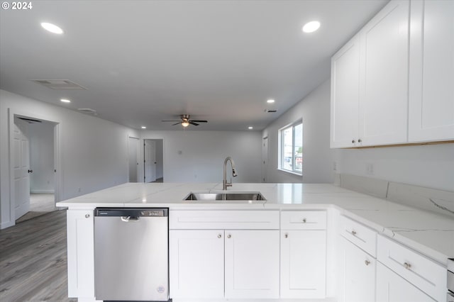 kitchen with white cabinetry, dishwasher, ceiling fan, sink, and kitchen peninsula