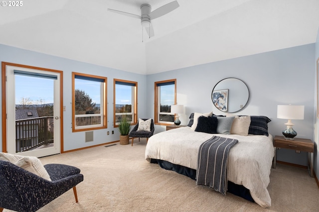 bedroom featuring vaulted ceiling, light colored carpet, access to exterior, and ceiling fan