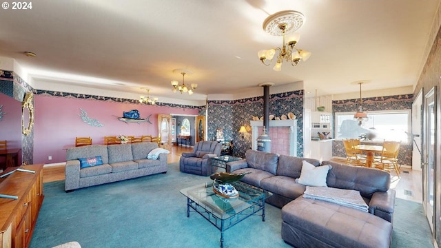 1545 Beach Ave, Brookings, OR 97415 - carpeted living room featuring a notable chandelier