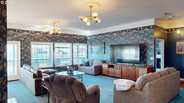 1545 Beach Ave, Brookings, OR 97415 - carpeted living room featuring a chandelier