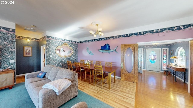 1545 Beach Ave, Brookings, OR 97415 - dining area with an inviting chandelier and wood-type flooring