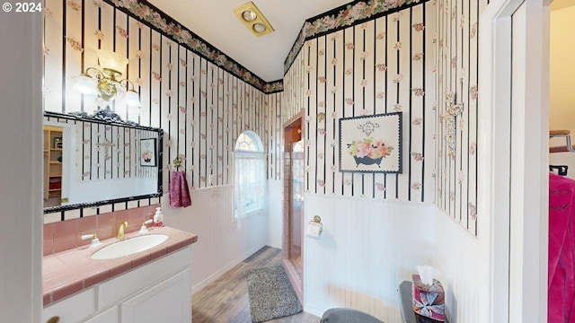 1545 Beach Ave, Brookings, OR 97415 - bathroom featuring vanity, a shower with door, and hardwood / wood-style floors