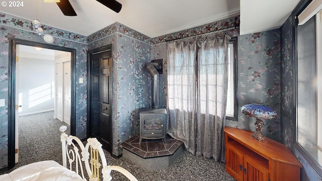 1545 Beach Ave, Brookings, OR 97415 - interior space featuring ceiling fan and a wood stove