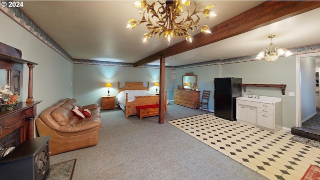 1545 Beach Ave, Brookings, OR 97415 - carpeted bedroom featuring black refrigerator, a chandelier, and beam ceiling