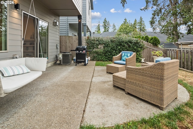 view of patio featuring central air condition unit and outdoor lounge area