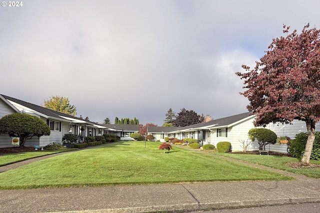 exterior space featuring a lawn