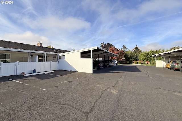 view of parking with a carport