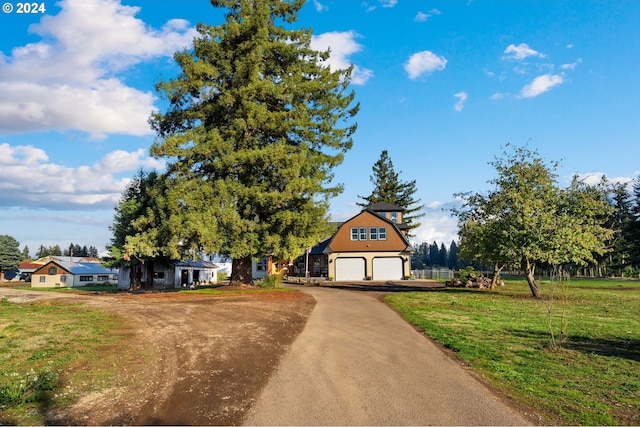 view of front of home featuring a front lawn