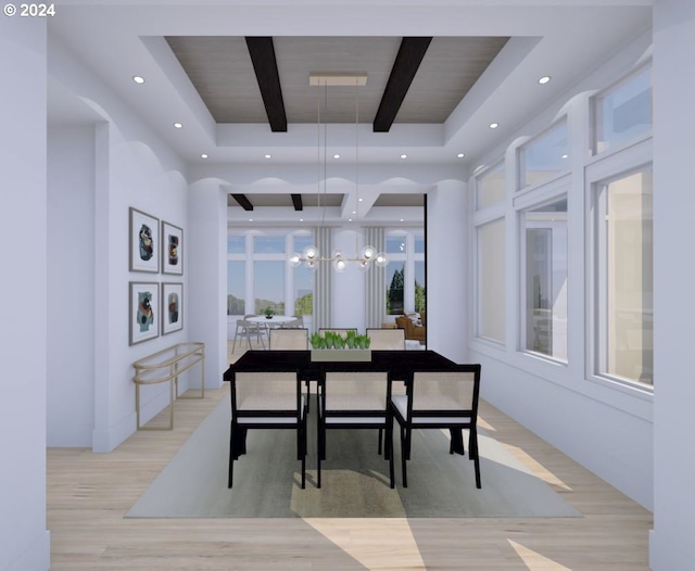 dining area with light wood-type flooring, a raised ceiling, a chandelier, beam ceiling, and a wealth of natural light