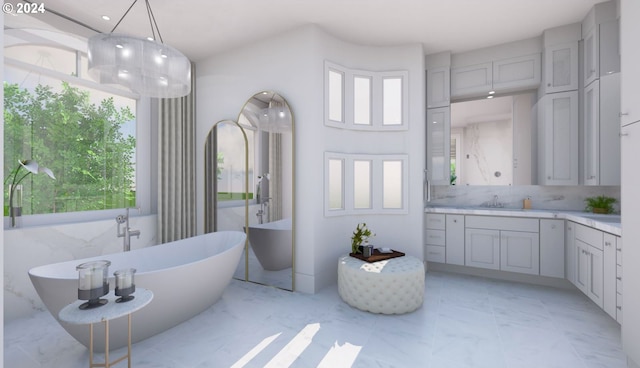 bathroom featuring tile patterned flooring, plenty of natural light, and vanity