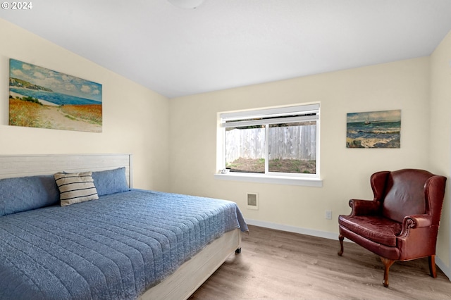 bedroom featuring wood-type flooring