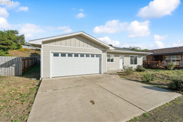 single story home with a garage