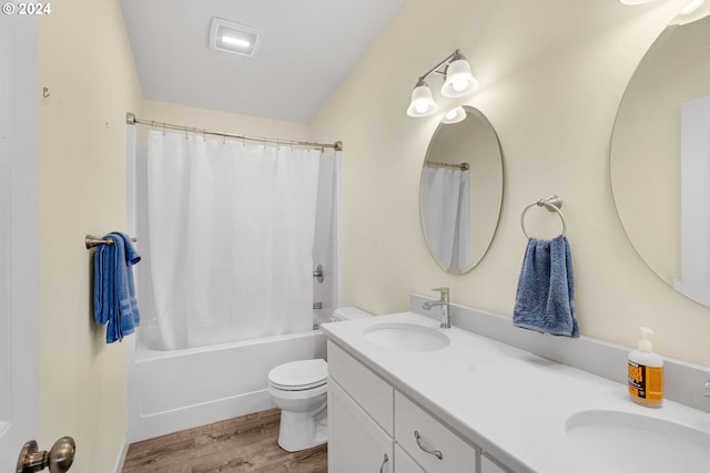 full bathroom featuring shower / bathtub combination with curtain, vanity, toilet, and wood-type flooring