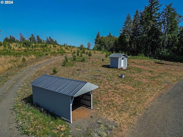 exterior space featuring a storage unit