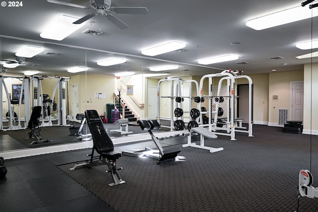 workout area with ceiling fan