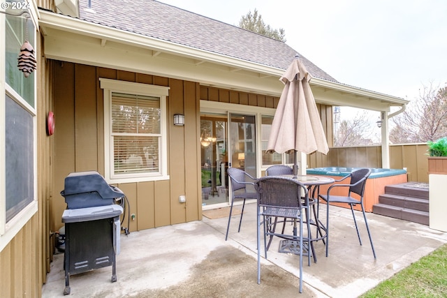 view of patio / terrace featuring a hot tub