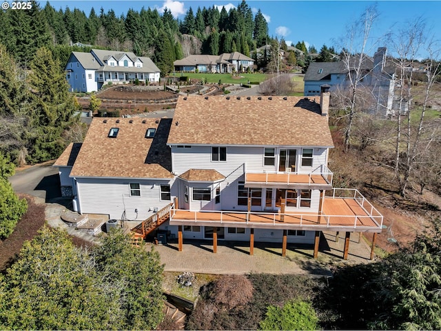 birds eye view of property with a residential view